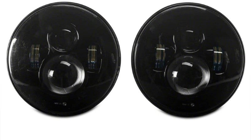 Raxiom J108042 97-18 Jeep Wrangler TJ/JK Axial Series LED Daymaker Headlights- Black Housing (Clear Lens)