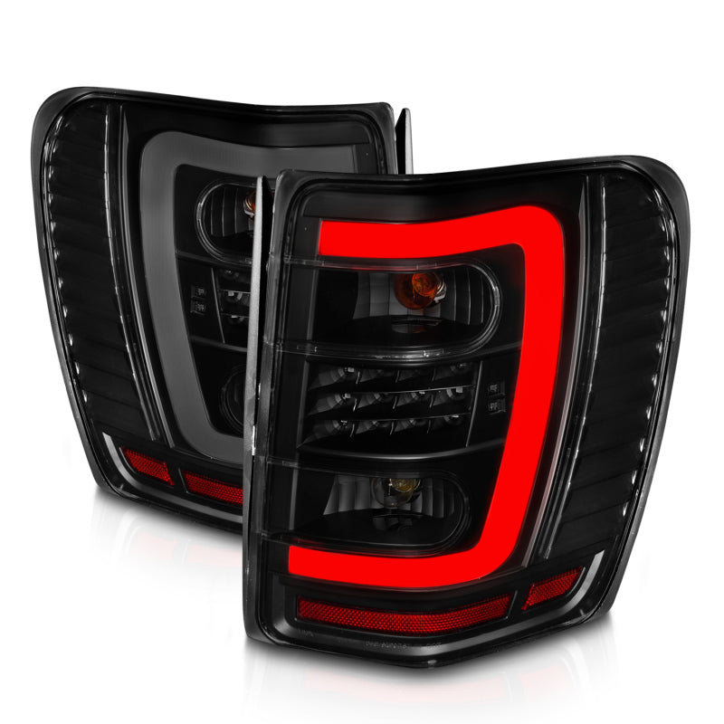 ANZO 311395 1999-2004 Jeep Grand Cherokee LED Tail Lights w/ Light Bar Black Housing Smoke Lens