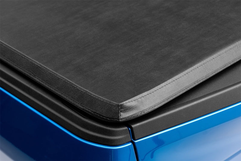LUND 950172 Lund 15-18 Ford F-150 (5.5ft. Bed) Genesis Tri-Fold Tonneau Cover - Black