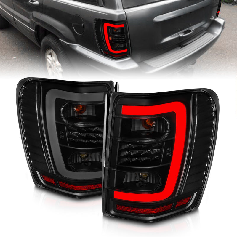 ANZO 311395 1999-2004 Jeep Grand Cherokee LED Tail Lights w/ Light Bar Black Housing Smoke Lens