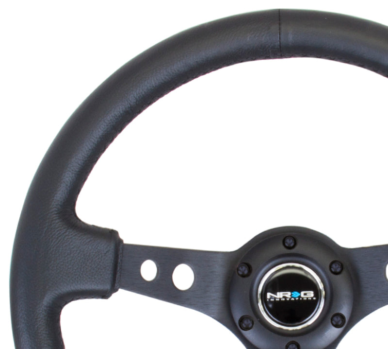 NRG RST-006BK Reinforced Steering Wheel (350mm / 3in. Deep) Blk Leather w/Blk Spoke & Circle Cutouts