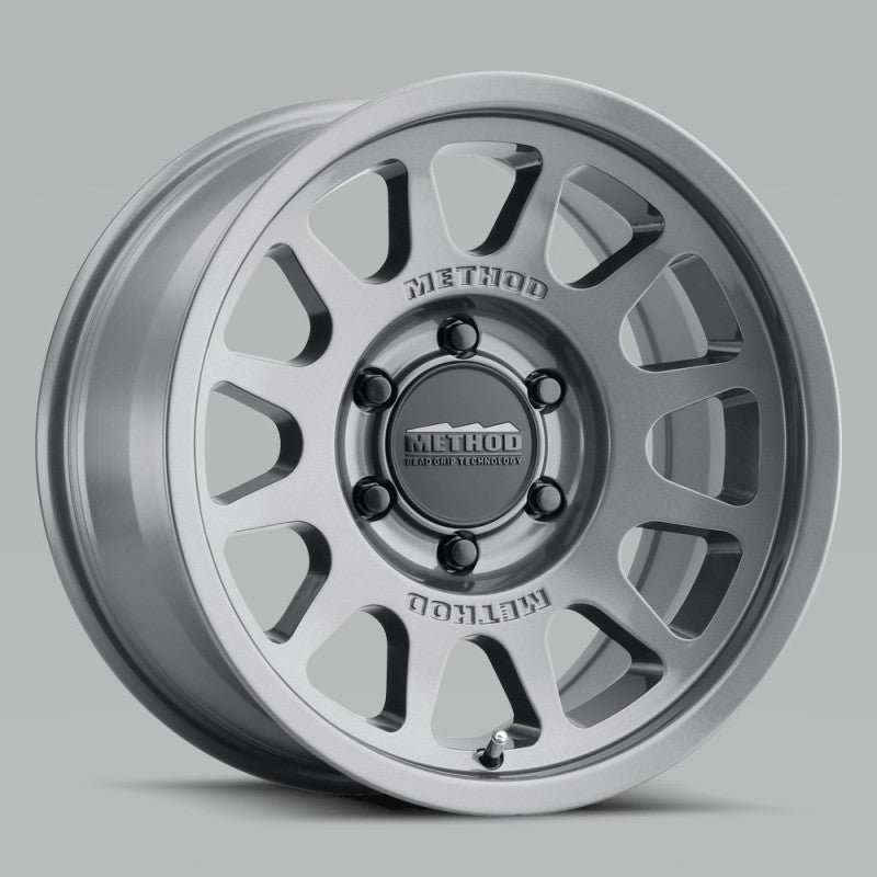 Method Wheels MR70357051815 Method MR703 15x7 +15mm Offset 5x100 56.1mm CB Gloss Titanium Wheel