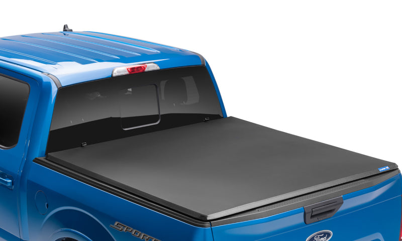 LUND 95090 Lund 05-17 Nissan Frontier (5ft. Bed w/o Utility TRack) Genesis Tri-Fold Tonneau Cover - Black