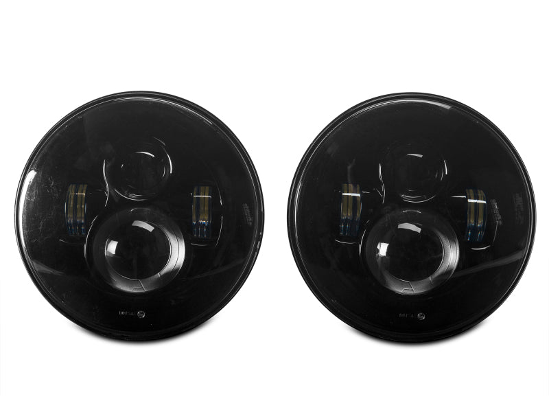 Raxiom J108042 97-18 Jeep Wrangler TJ/JK Axial Series LED Daymaker Headlights- Black Housing (Clear Lens)