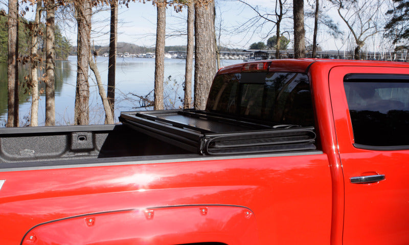 LUND 969450 Lund 04-15 Nissan Titan (5.5ft. Bed) Hard Fold Tonneau Cover w/Bracket Kit - Black