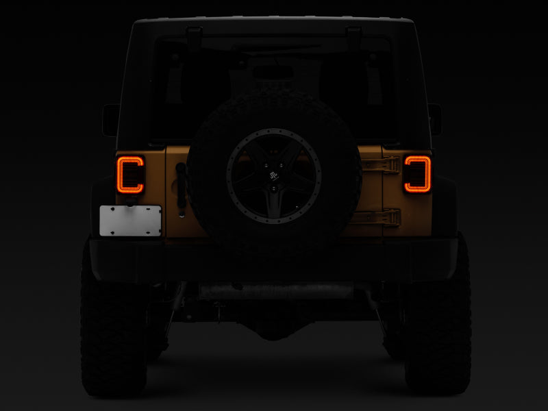 Raxiom J138358 07-18 Jeep Wrangler JK Axial Series LED Halo Tail Lights- Black Housing (Dark Smoked Lens)