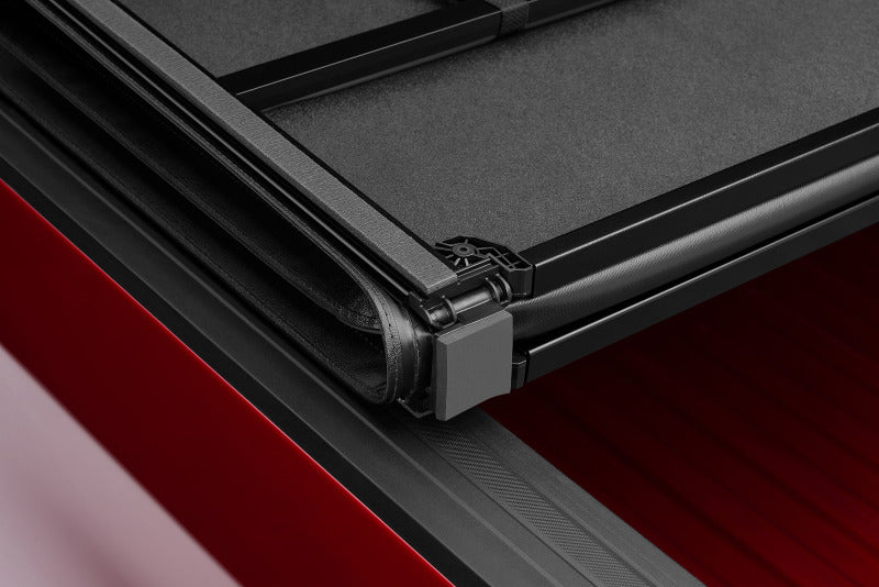 LUND 969250 Lund 02-17 Dodge RAM 1500 Fleetside (6.4ft. Bed) Hard Fold Tonneau Cover - Black