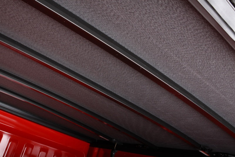 LUND 958120 Lund 07-17 Toyota Tundra (5.5ft. Bed) Genesis Elite Tri-Fold Tonneau Cover - Black