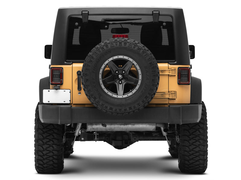 Raxiom J138358 07-18 Jeep Wrangler JK Axial Series LED Halo Tail Lights- Black Housing (Dark Smoked Lens)