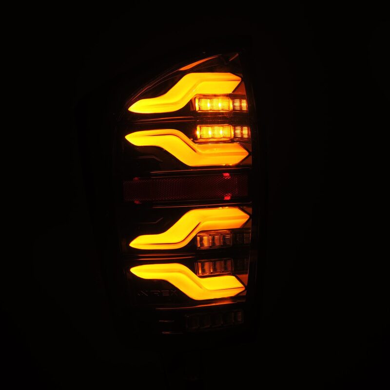 AlphaRex 680080 16-21 Toyota Tacoma LUXX LED Taillights Alpha Blk w/Activ Light/Seq Signal