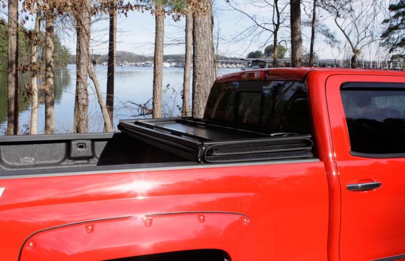 LUND 969364 Lund 15-18 Ford F-150 Styleside (5.5ft. Bed) Hard Fold Tonneau Cover - Black