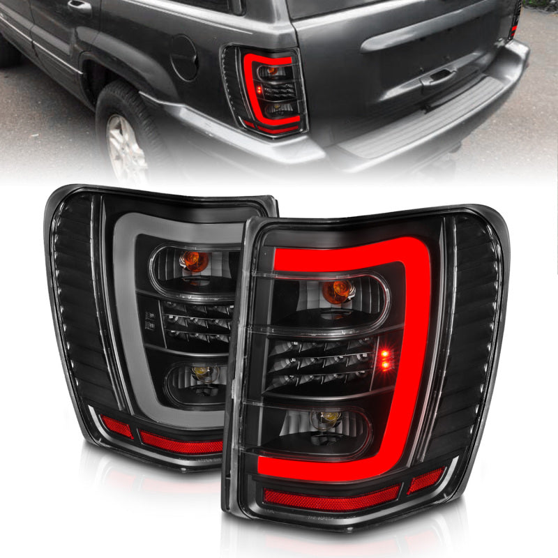 ANZO 311394 1999-2004 Jeep Grand Cherokee LED Tail Lights w/ Light Bar Black Housing Clear Lens