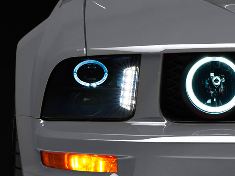 Raxiom 49128 05-09 Ford Mustang w/ Halogen LED Halo Prjctr Headlights-Blk Hsng(Smoked Lens Exclude GT500)