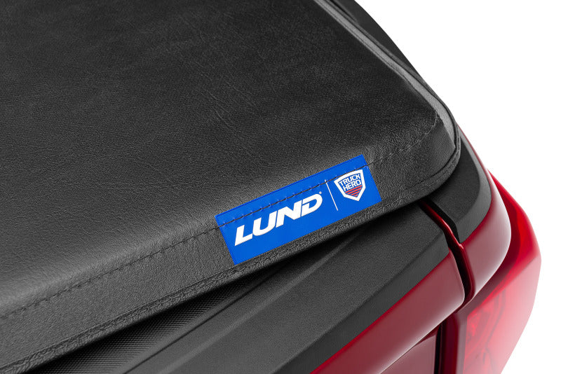 LUND 969251 Lund 09-17 Dodge RAM 1500 Fleetside (5.7ft. Bed) Hard Fold Tonneau Cover - Black