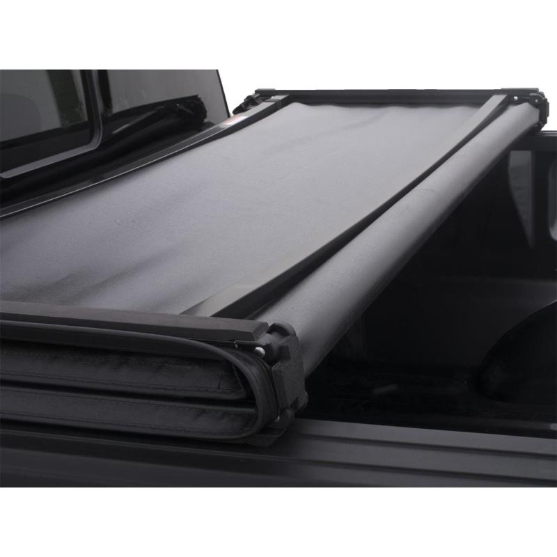 LUND 950172 Lund 15-18 Ford F-150 (5.5ft. Bed) Genesis Tri-Fold Tonneau Cover - Black