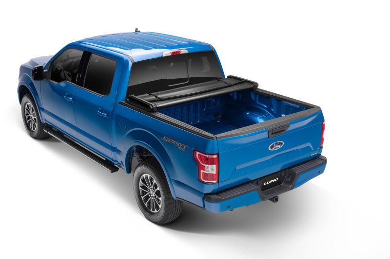 LUND 95090 Lund 05-17 Nissan Frontier (5ft. Bed w/o Utility TRack) Genesis Tri-Fold Tonneau Cover - Black