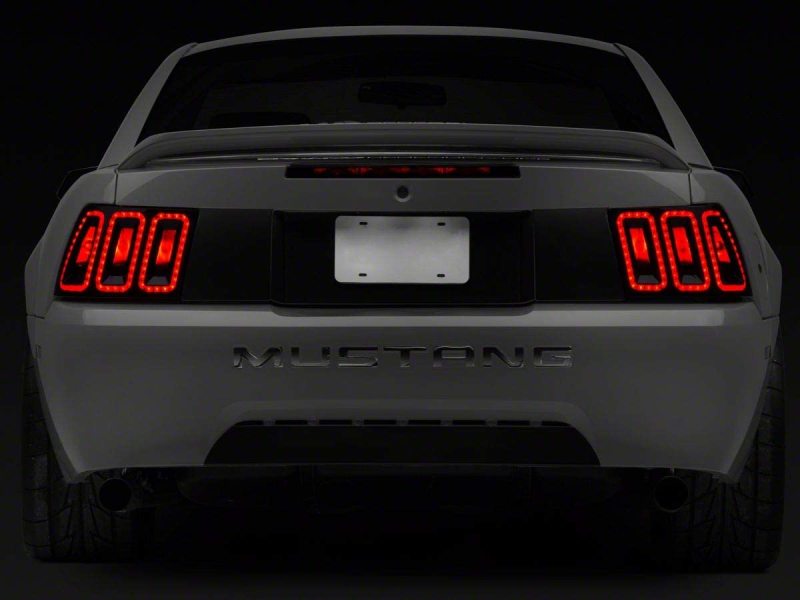 Raxiom 100807 99-04 Ford Mustang Excluding 99-01 Cobra Icon LED Tail Lights- Black Housing (Smoked Lens)