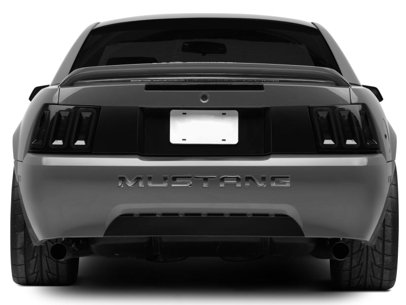 Raxiom 100807 99-04 Ford Mustang Excluding 99-01 Cobra Icon LED Tail Lights- Black Housing (Smoked Lens)