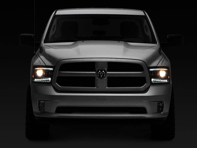 Raxiom R111520 09-18 RAM 1500 LED Projector Headlights w/ Switchback Turn Signals- Blk Housing (Clear Lens)