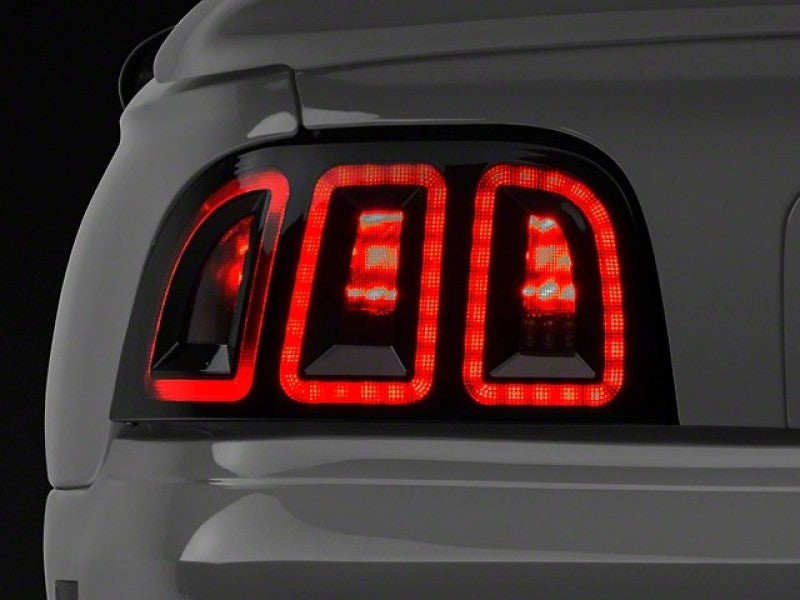 Raxiom 389876 96-98 Ford Mustang Icon LED Tail Lights- Black Housing (Smoked Lens)