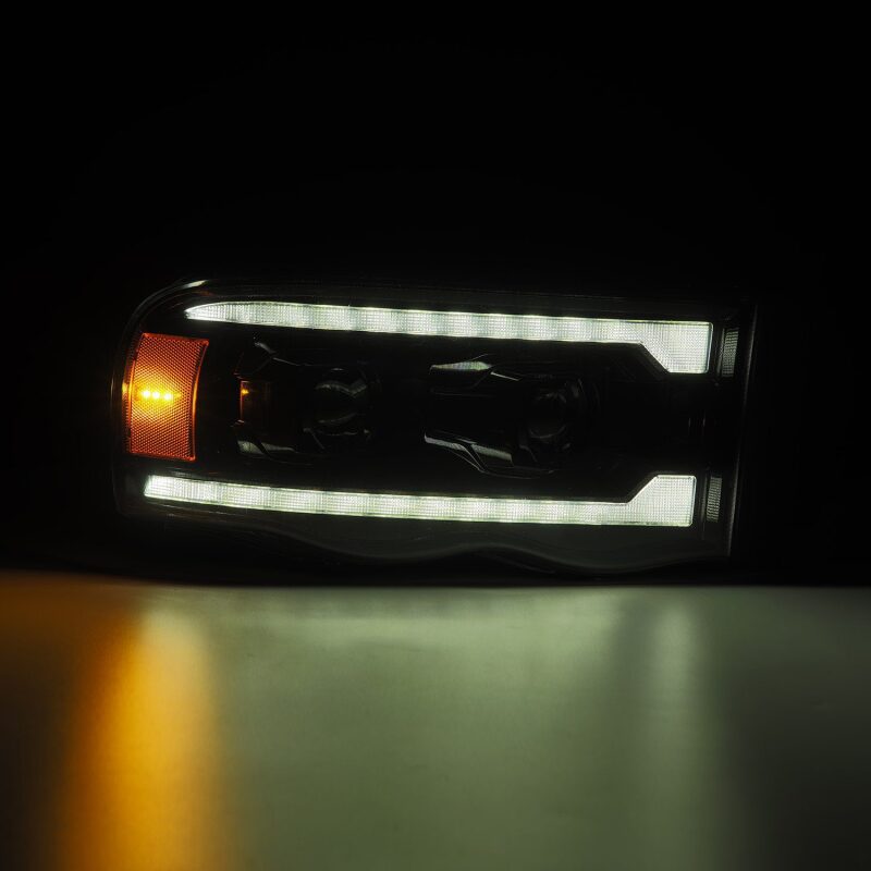 AlphaRex 880569 02-05 Dodge RAM 1500 LUXX LED Proj Headlights Alpha Black w/Activ Light/Seq Signal
