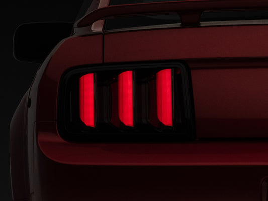 Raxiom 408588 05-09 Ford Mustang Vector V2 LED Tail Lights- Black Housing (Smoked Lens)