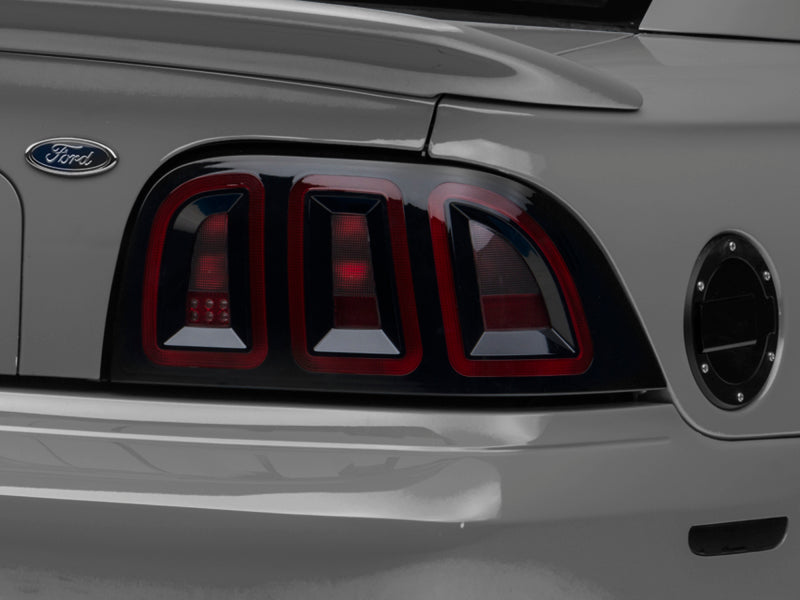 Raxiom 389876 96-98 Ford Mustang Icon LED Tail Lights- Black Housing (Smoked Lens)