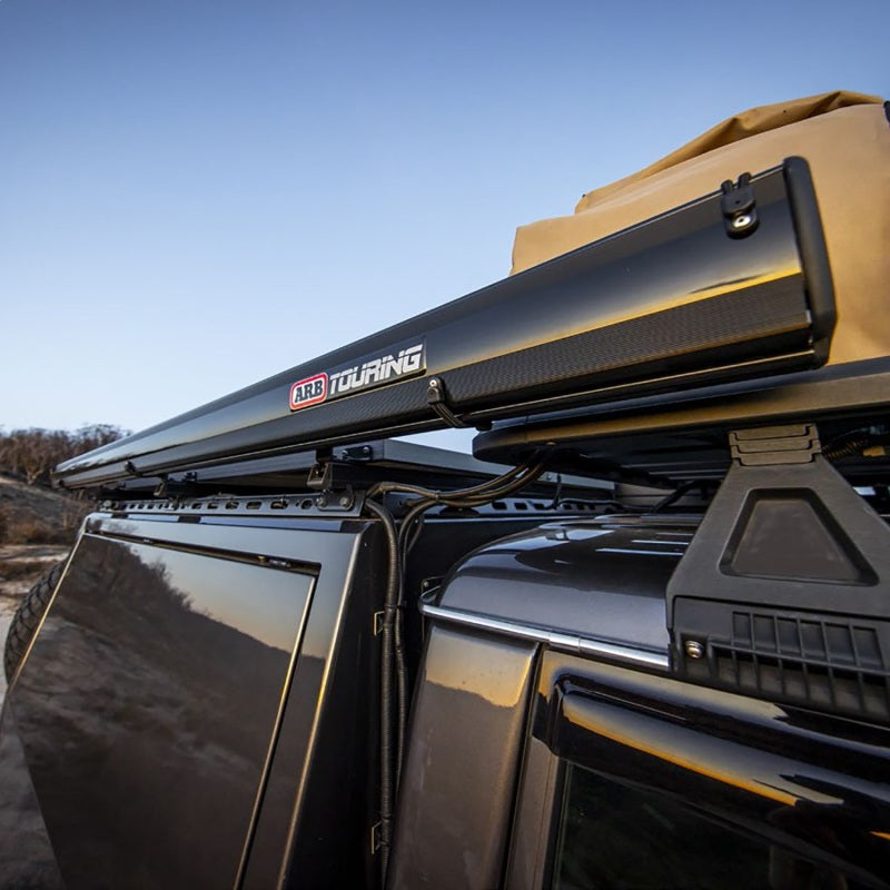 ARB 814412A Aluminum Awning, Black Frame, 8.2FT x 8.2FT, Installed with LED Light Strip