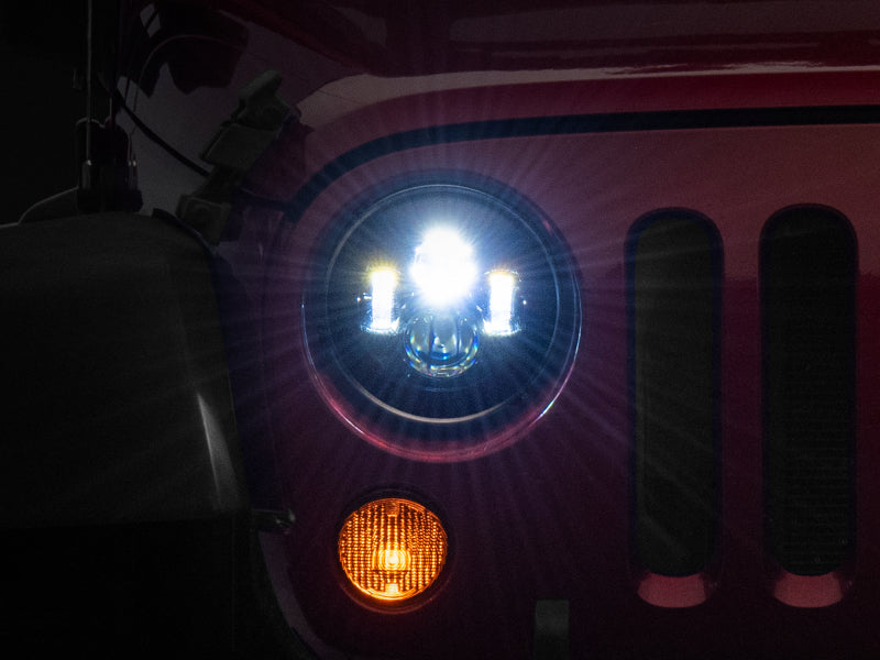 Raxiom J108042 97-18 Jeep Wrangler TJ/JK Axial Series LED Daymaker Headlights- Black Housing (Clear Lens)