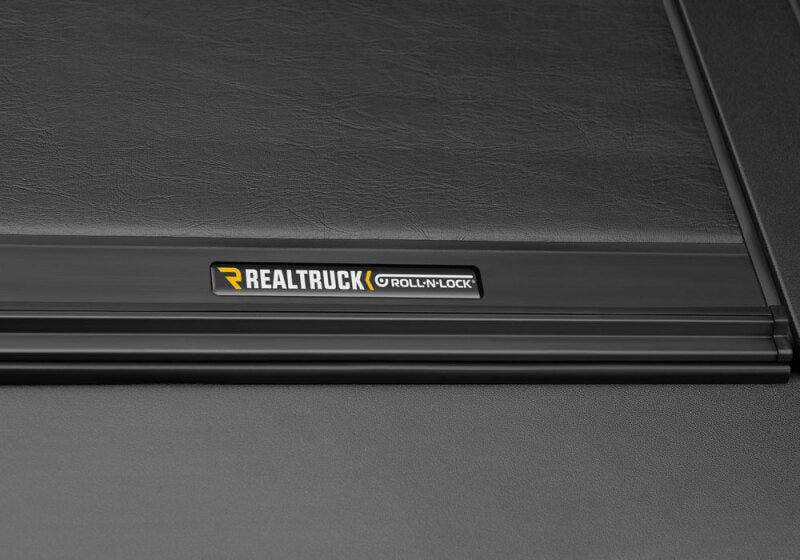 Roll-N-Lock LG402M 19-23 RAM 1500 w/o Swing Gate Tailgate SB 76.3in M-Series Retractable Tonneau Cover