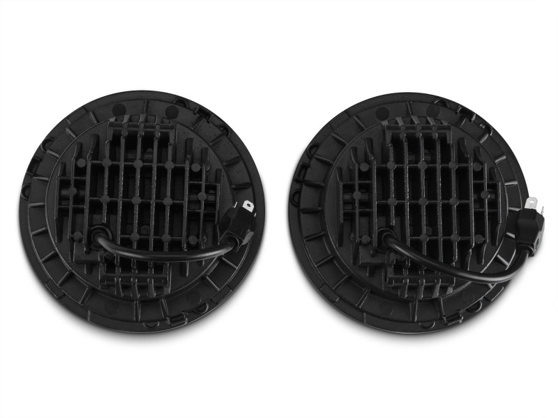 Raxiom J108042 97-18 Jeep Wrangler TJ/JK Axial Series LED Daymaker Headlights- Black Housing (Clear Lens)