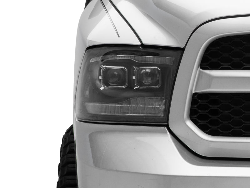Raxiom R111520 09-18 RAM 1500 LED Projector Headlights w/ Switchback Turn Signals- Blk Housing (Clear Lens)