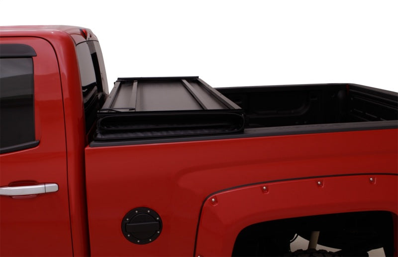 LUND 969450 Lund 04-15 Nissan Titan (5.5ft. Bed) Hard Fold Tonneau Cover w/Bracket Kit - Black