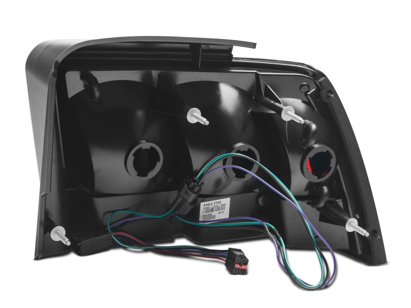 Raxiom 100807 99-04 Ford Mustang Excluding 99-01 Cobra Icon LED Tail Lights- Black Housing (Smoked Lens)