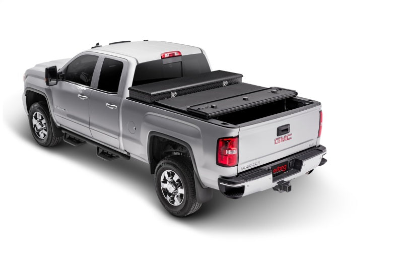 Extang 84450 14-16 Chevy/GMC Silv/Sierra 1500 (6.5ft) / 14-16 2500/3500HD Solid Fold 2.0 Toolbox