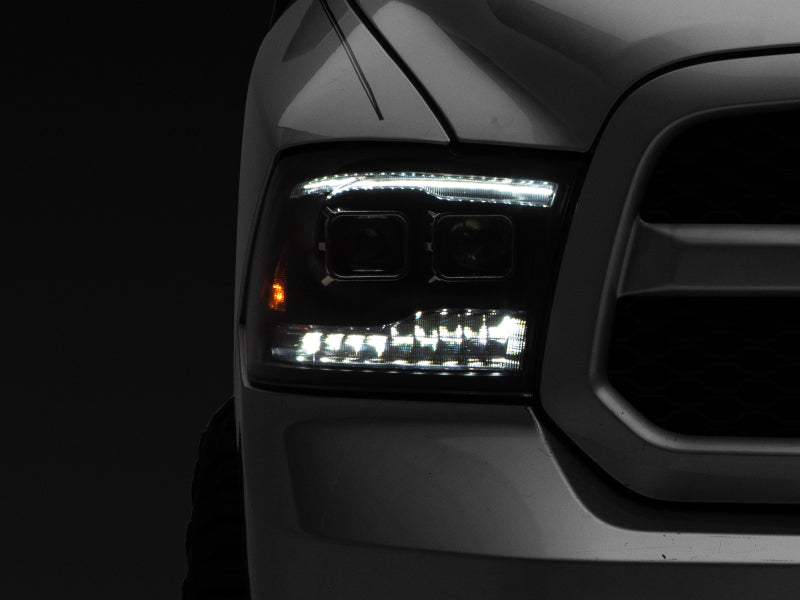Raxiom R111520 09-18 RAM 1500 LED Projector Headlights w/ Switchback Turn Signals- Blk Housing (Clear Lens)