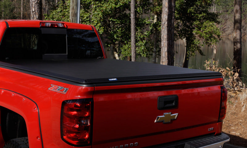 LUND 969558 Lund 14-17 Toyota Tundra Fleetside (5.5ft. Bed) Hard Fold Tonneau Cover - Black