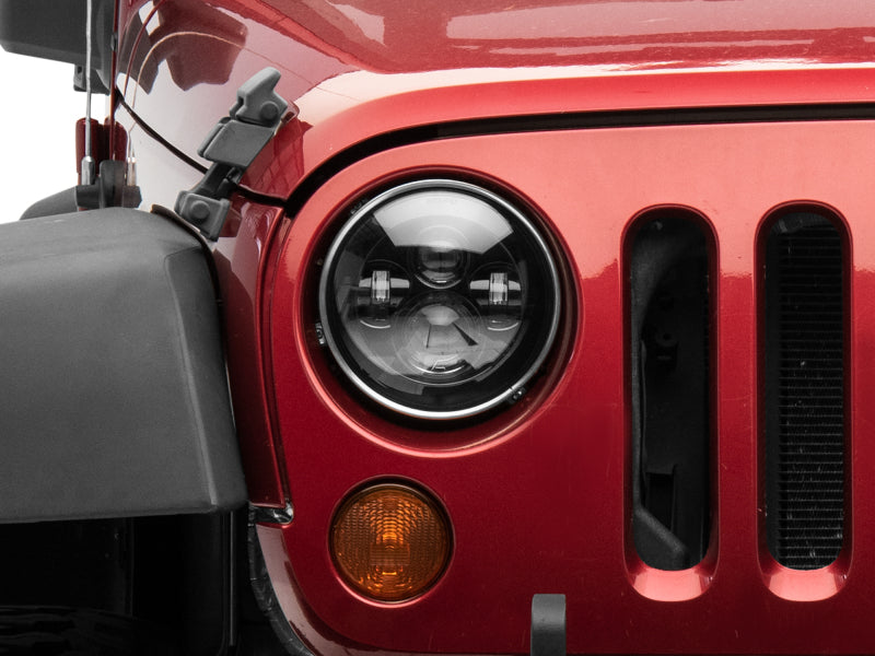 Raxiom J108042 97-18 Jeep Wrangler TJ/JK Axial Series LED Daymaker Headlights- Black Housing (Clear Lens)