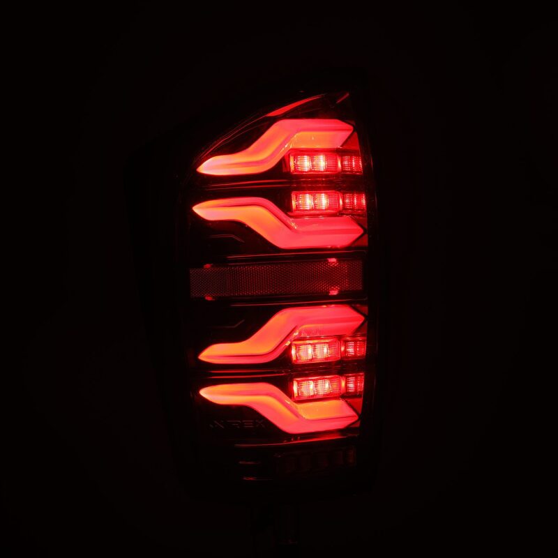 AlphaRex 680080 16-21 Toyota Tacoma LUXX LED Taillights Alpha Blk w/Activ Light/Seq Signal