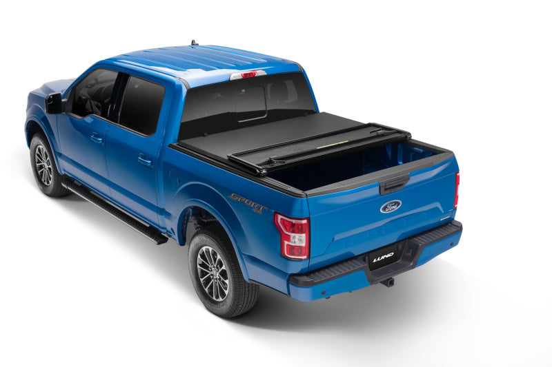 LUND 969352 Lund 99-17 Ford F-250 Super Duty Styleside (6.8ft. Bed) Hard Fold Tonneau Cover - Black