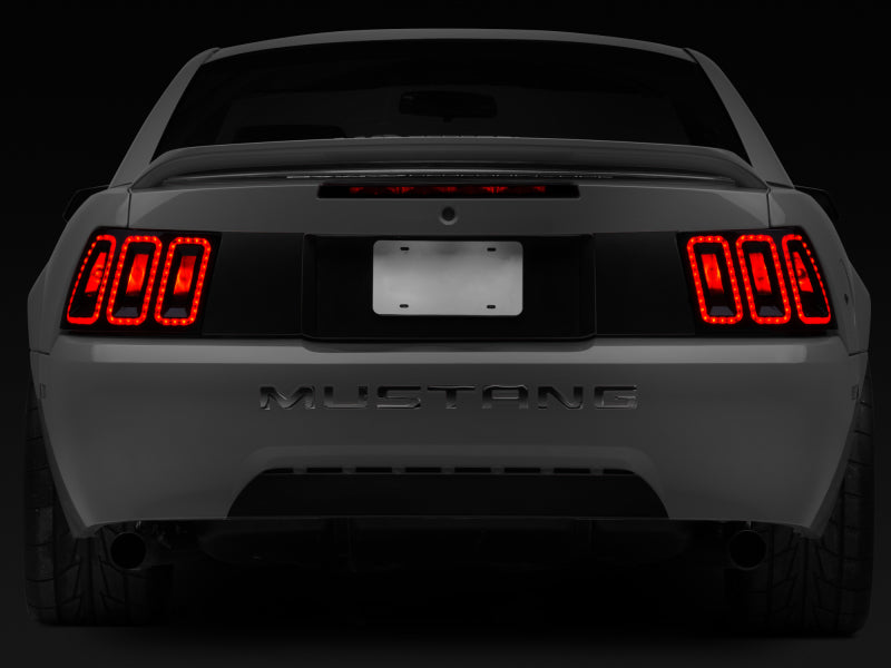 Raxiom 100807 99-04 Ford Mustang Excluding 99-01 Cobra Icon LED Tail Lights- Black Housing (Smoked Lens)