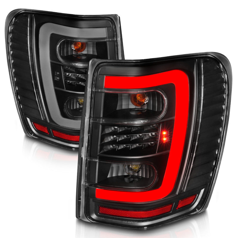 ANZO 311394 1999-2004 Jeep Grand Cherokee LED Tail Lights w/ Light Bar Black Housing Clear Lens