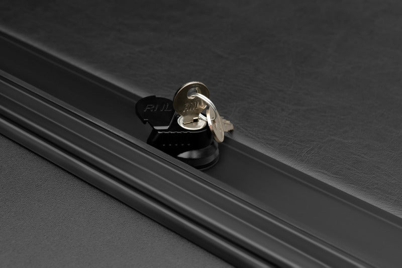 Roll-N-Lock LG402M 19-23 RAM 1500 w/o Swing Gate Tailgate SB 76.3in M-Series Retractable Tonneau Cover