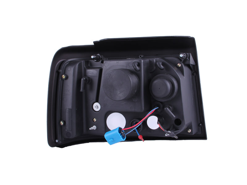 ANZO 111184 1992-1996 Ford F-150 Projector Headlights w/ Halo Black w/ Side Markers and Parking Lights