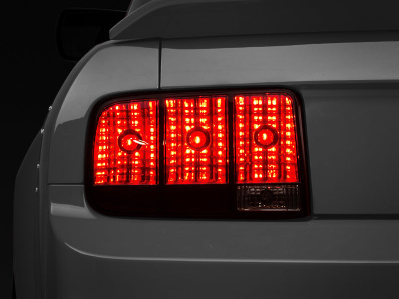 Raxiom 49066 05-09 Ford Mustang Tail Lights- Black Housing (Smoked Lens)