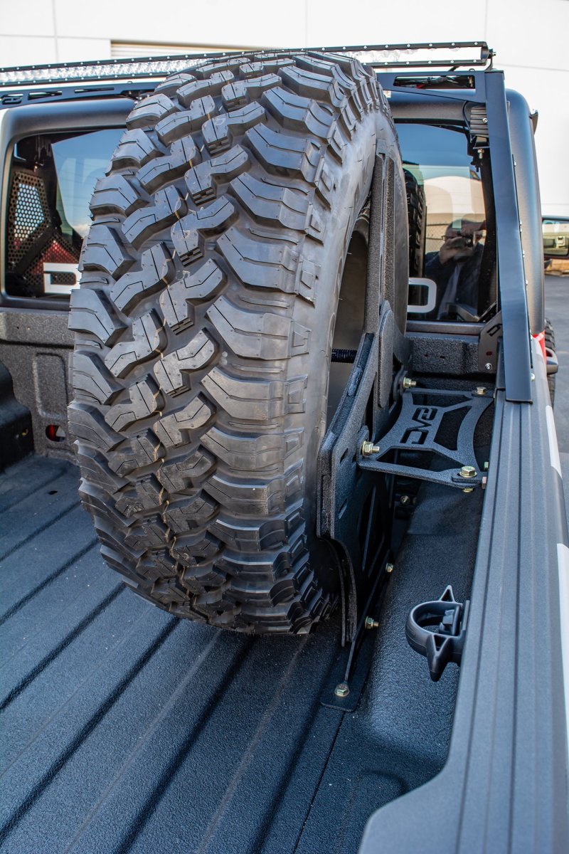 DV8 Offroad TCGL-02 2019+ Jeep Gladiator Universal Stand Up In-Bed Tire Carrier