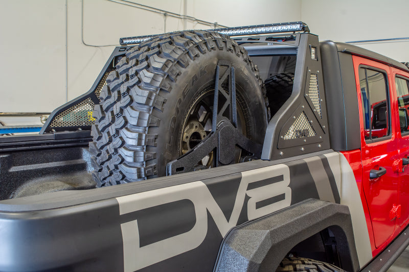 DV8 Offroad TCGL-02 2019+ Jeep Gladiator Universal Stand Up In-Bed Tire Carrier